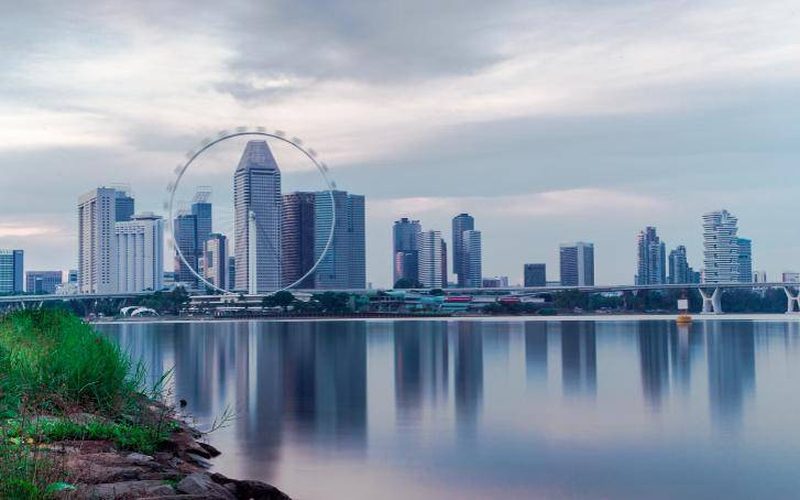 Singapore skyline and observation wheel across the water
